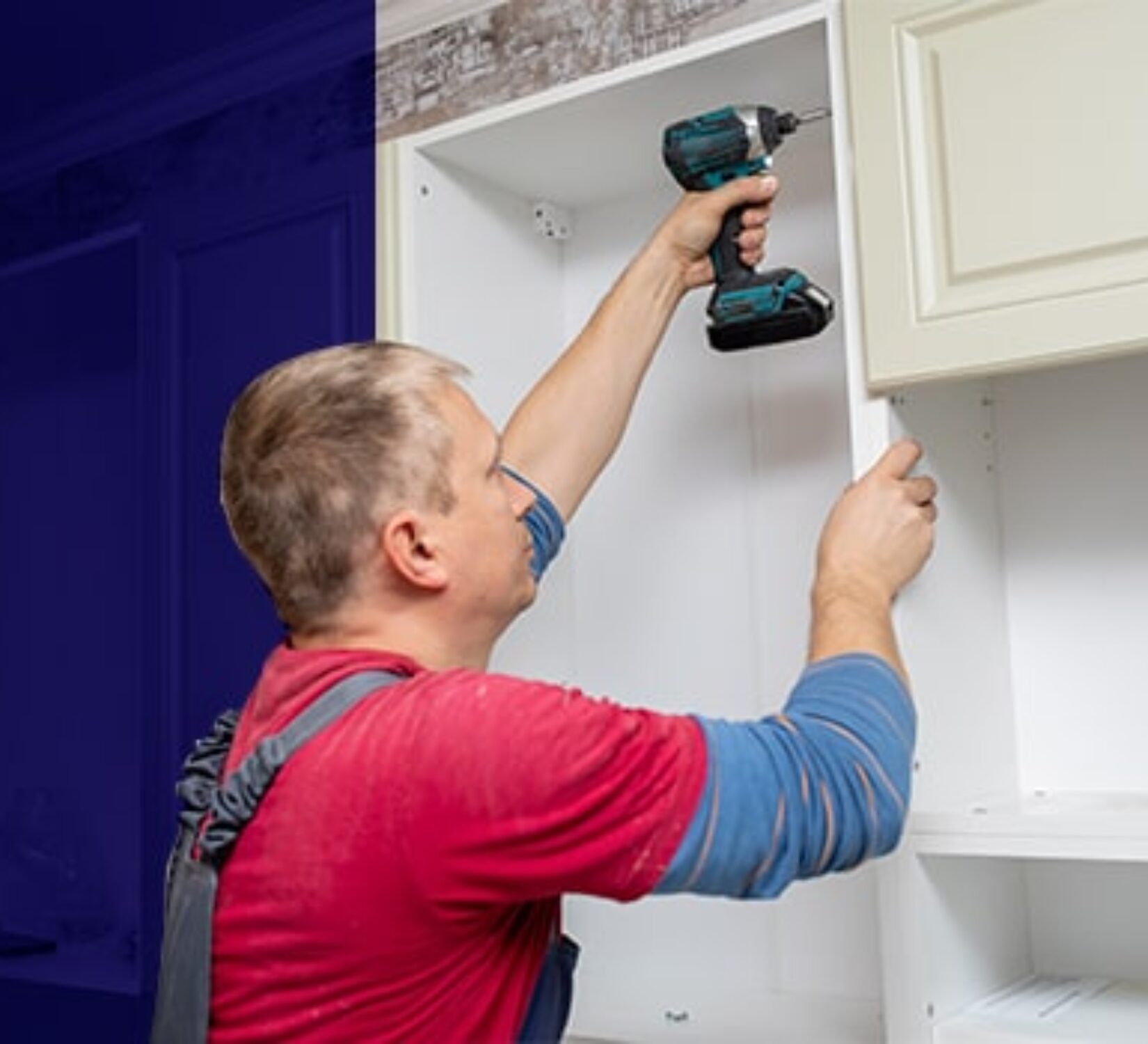 Kitchen remodeler installing new cabinets