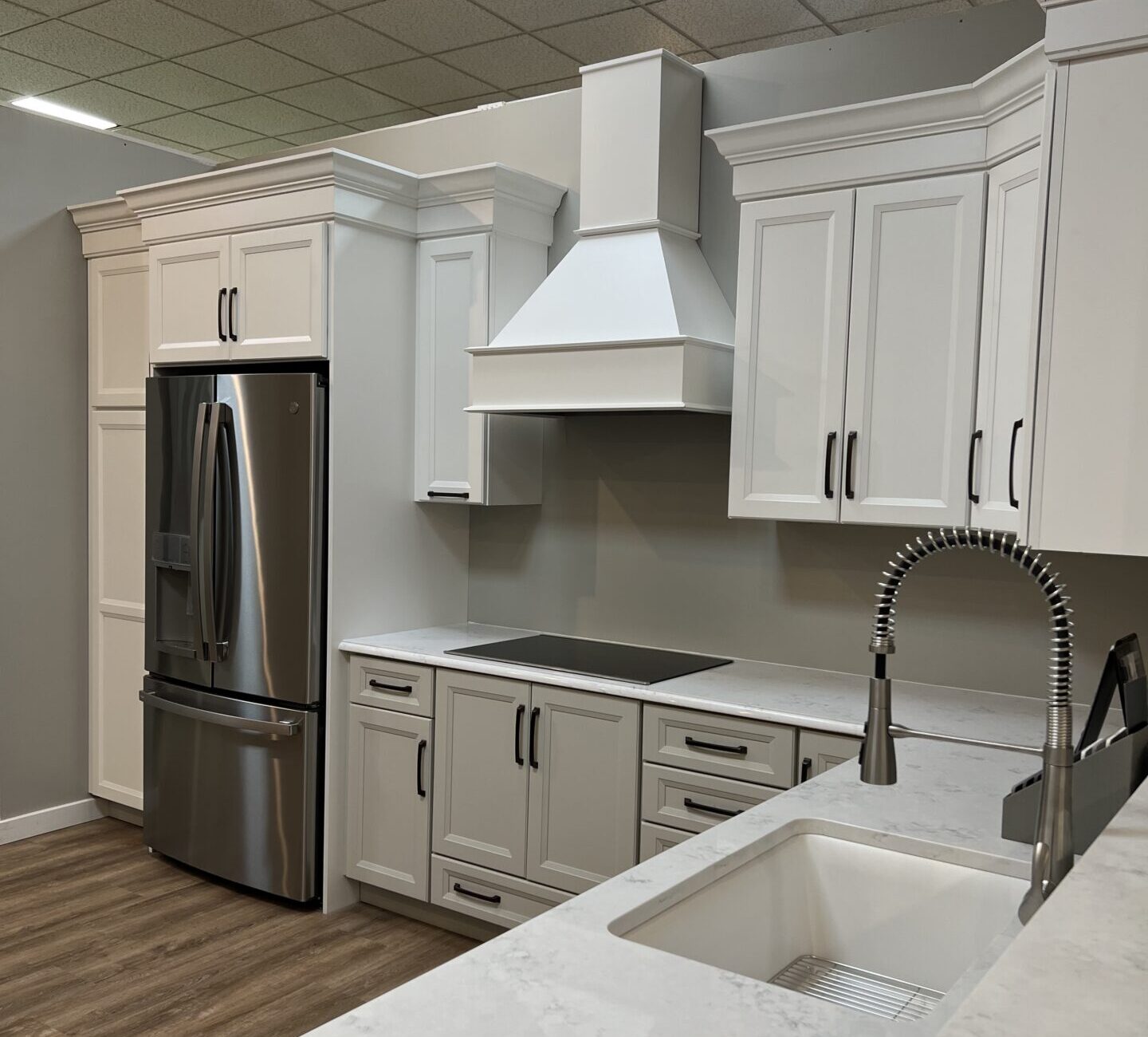 BKT Wilmington De Showroom white cabinet and white countertop kitchen