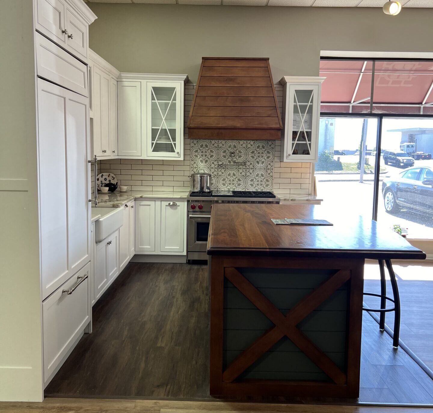 BKT Wilmington De Showroom white kitchen with blue and wooden island